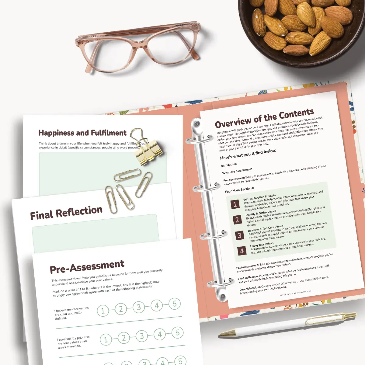 loose printable guided journaling pages core values workbook in open binder and notebook and pen