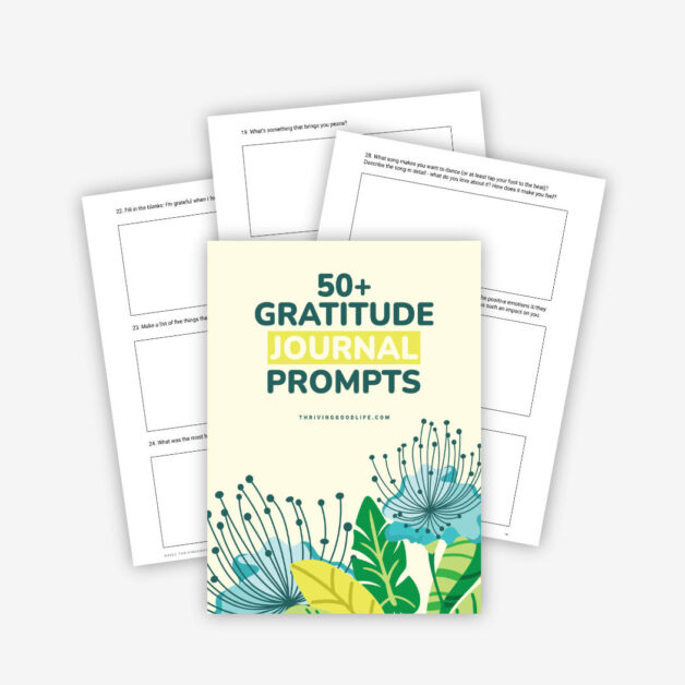flat lay gratitude prompt journaling pages on plain background